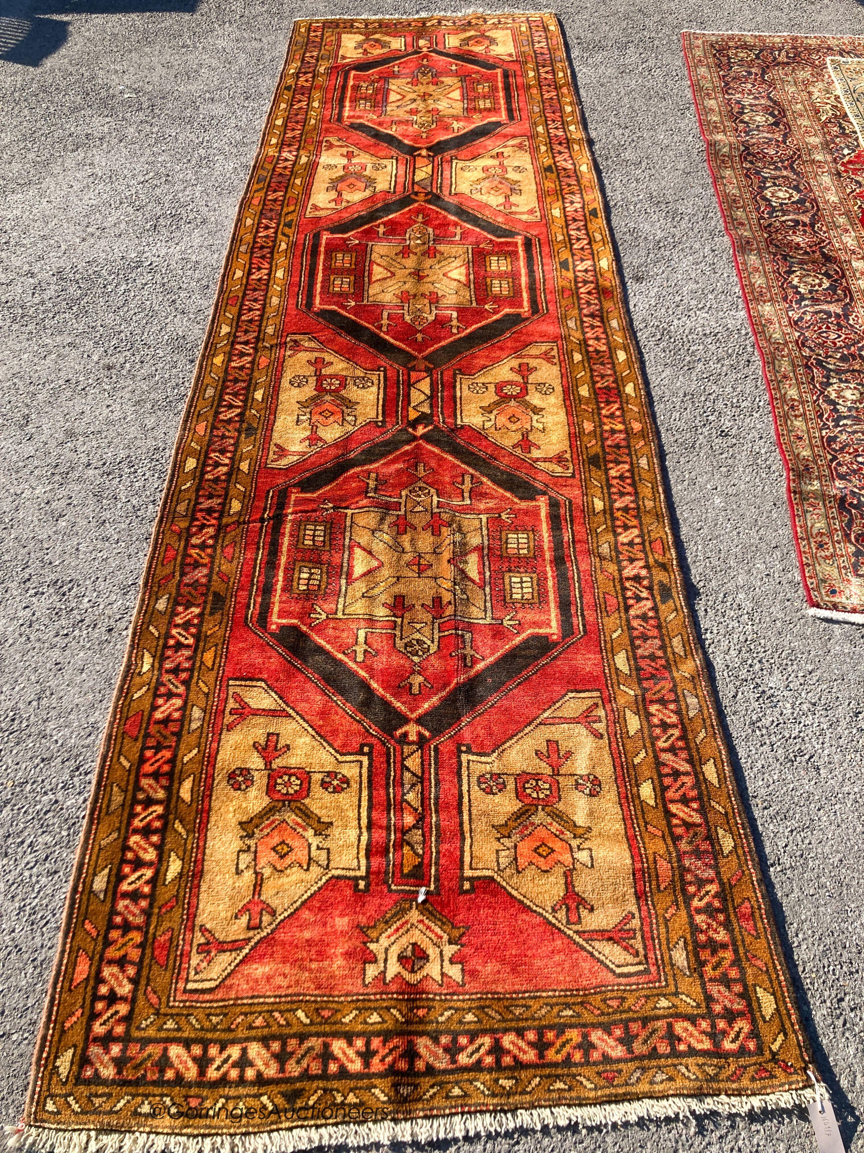 An Azarbijan rug, 400 x 110cm